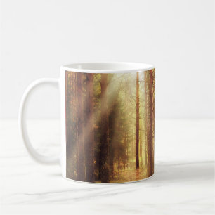 autumn landscape background, sun rays in the fores coffee mug