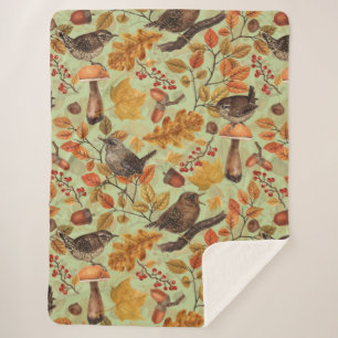 Autumn leaves, berries, mushrooms and wrens sherpa blanket
