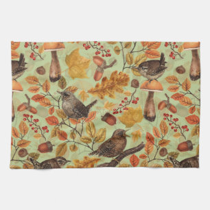 Autumn leaves, berries, mushrooms and wrens tea towel