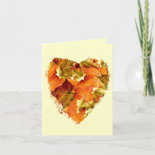 Autumn leaves in a heart shape, blank card