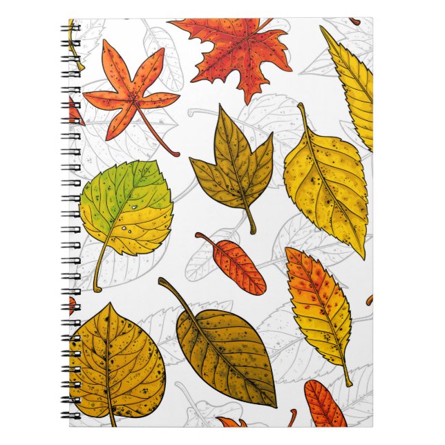 Autumn leaves on white notebook (Front)