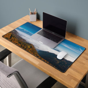 Autumn mountains and fog in the valley desk mat