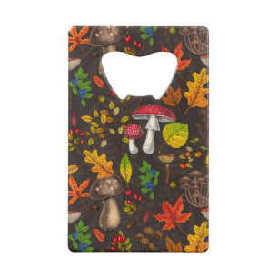 Autumn mushrooms, leaves, nuts and berries on blue