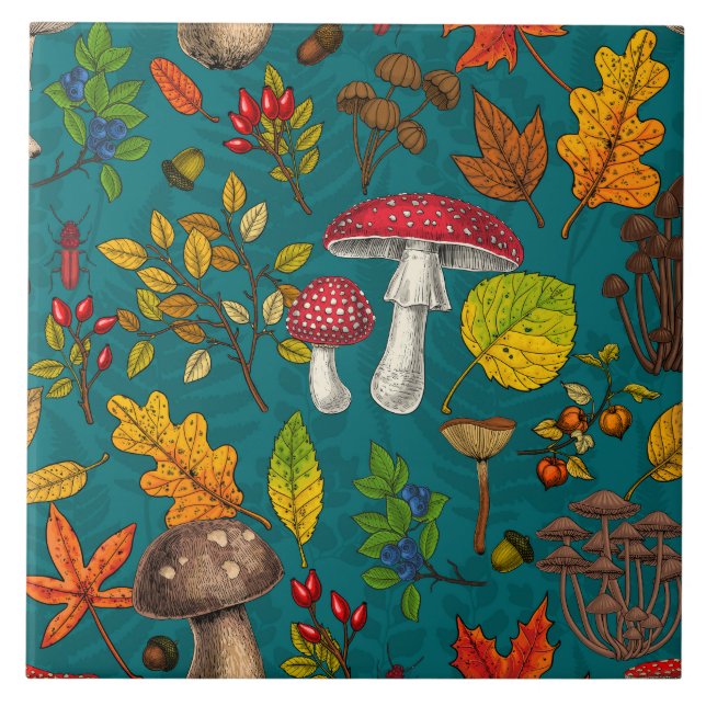 Autumn mushrooms, leaves, nuts and berries on blue ceramic tile (Front)