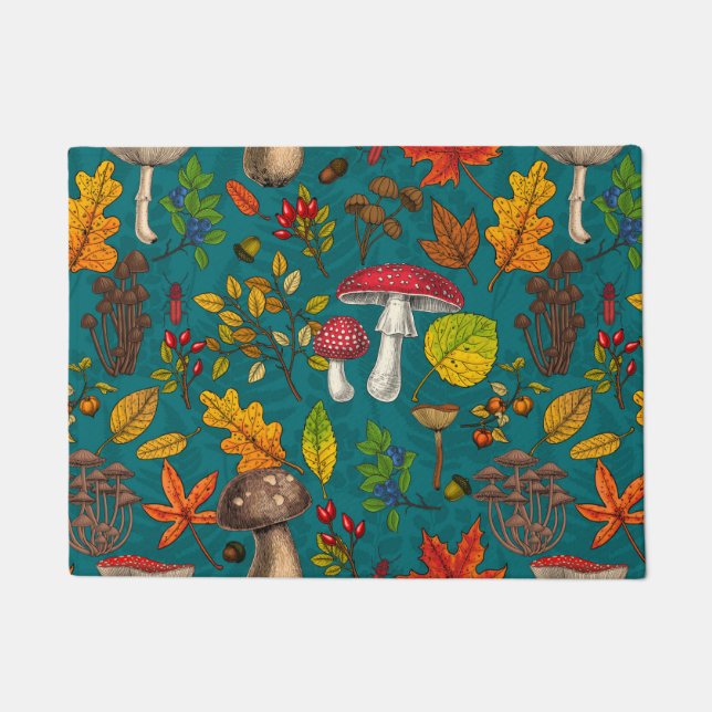 Autumn mushrooms, leaves, nuts and berries on blue doormat (Front)