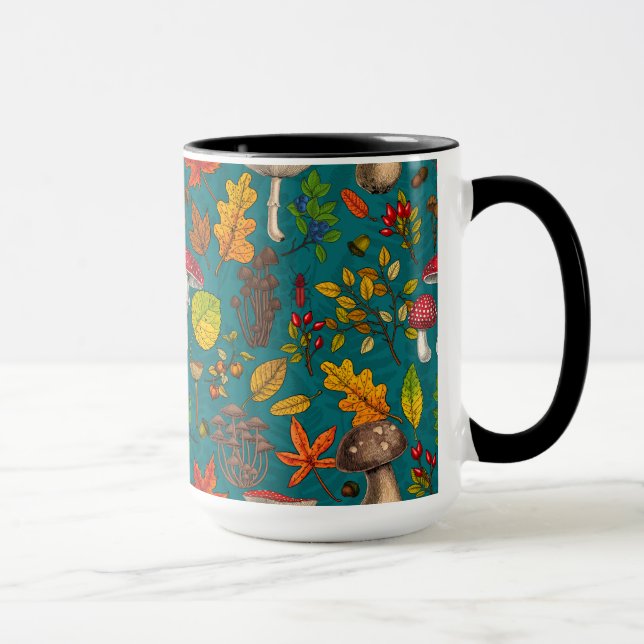 Autumn mushrooms, leaves, nuts and berries on blue mug (Right)