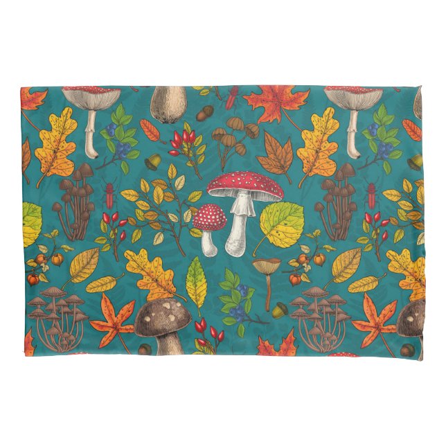 Autumn mushrooms, leaves, nuts and berries on blue pillowcase (Front-Left)