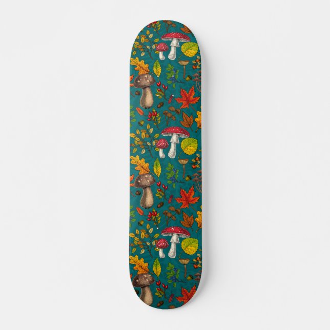 Autumn mushrooms, leaves, nuts and berries on blue skateboard (Front)
