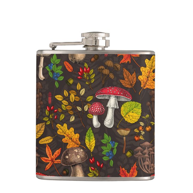Autumn mushrooms, leaves, nuts and berries on dark hip flask (Front)
