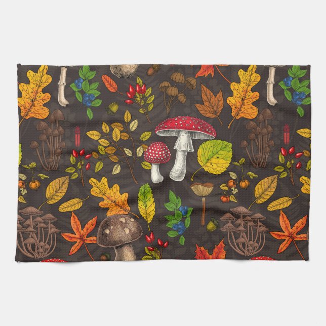 Autumn mushrooms, leaves, nuts and berries on dark tea towel (Horizontal)