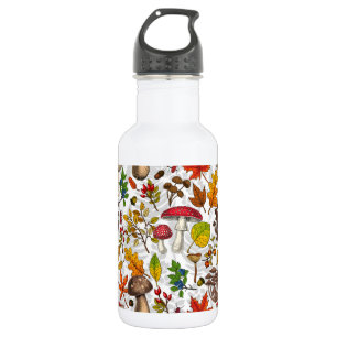 Autumn mushrooms, leaves, nuts and berries on whit 532 ml water bottle