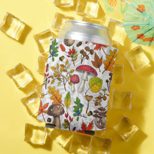 Autumn mushrooms, leaves, nuts and berries on whit can cooler