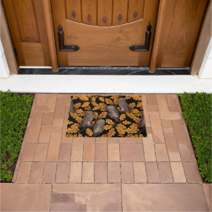 Autumn owls on black doormat