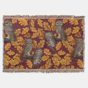 Autumn owls on dark red throw blanket
