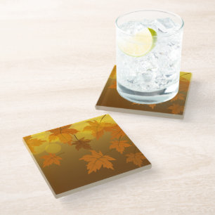 Autumn pattern with falling maple leaves and bokeh glass coaster