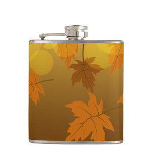 Autumn pattern with falling maple leaves and bokeh hip flask