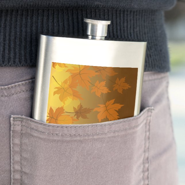 Autumn pattern with falling maple leaves and bokeh hip flask (In Situ)