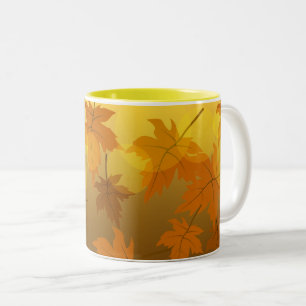 Autumn pattern with falling maple leaves and bokeh Two-Tone coffee mug