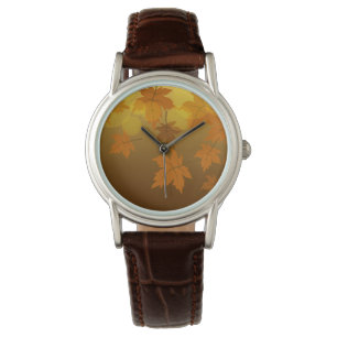 Autumn pattern with falling maple leaves and bokeh watch