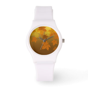 Autumn pattern with falling maple leaves and bokeh watch