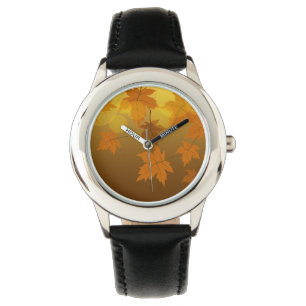 Autumn pattern with falling maple leaves and bokeh watch
