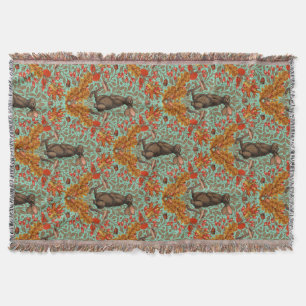 Autumn rabbit on light green throw blanket