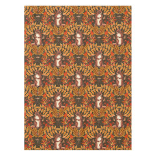 Autumn squirrel on dark brown tablecloth