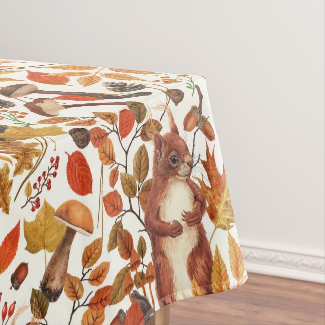 Autumn squirrels and autumnal flora on off white tablecloth (In Situ)