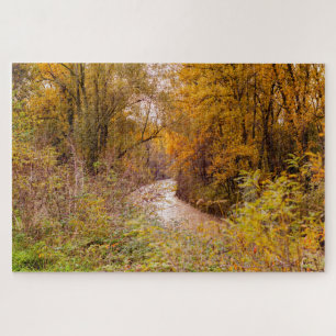 Autumnal colours landscape on a river into wood jigsaw puzzle