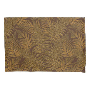 Autumnal fern on brown pillowcase