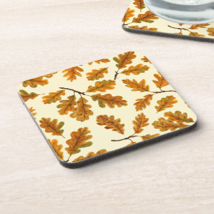Autumnal oak leaves on off white coaster