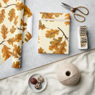 Autumnal oak leaves on off white wrapping paper