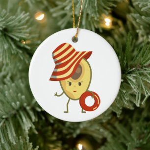 Avocado beach girl with sun hat and swim ring ceramic ornament