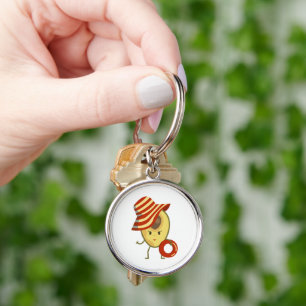 Avocado beach girl with sun hat and swim ring key ring