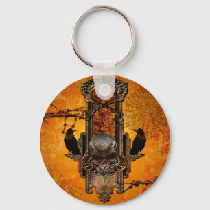 Awesome skulls and crow on a button with roses key ring