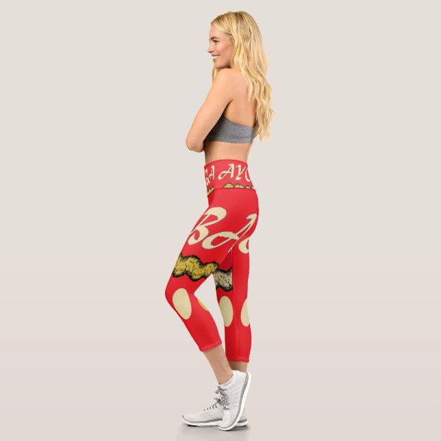 Ayoba African design bright red and mustard Capri Leggings (Left)