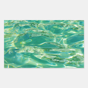 Azure water under bright noon sun rectangular sticker