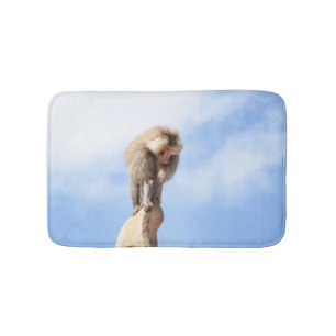 Baboon monkey on top of a mountain bath mat