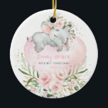 Baby 1st First Christmas Blush Floral Elephant Ceramic Ornament<br><div class="desc">This adorable Christmas ornament features elegant blush pink roses,  soft botanical greenery in green and gold,  and an adorable sleeping baby elephant lying on a pretty heart-shaped balloon. Click the "customise further" button if you wish to re-arrange and format the style and placement of the text.</div>