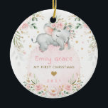 Baby 1st First Christmas Dreamy Blush Elephant Ceramic Ornament<br><div class="desc">This adorable Christmas ornament features elegant blush pink roses,  soft botanical greenery in green and gold,  and an adorable sleeping baby elephant lying on a pretty pink moon . Click the "customise further" button if you wish to re-arrange and format the style and placement of the text.</div>