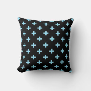 Baby blue polka crosses on black cushion