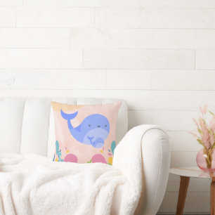 Baby blue whale in pink ocean scene cushion