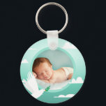 Baby Boy Baptism Dove Clouds Photo Frame Key Ring<br><div class="desc">Celebrate your baby boy's special baptism day with this beautiful keychain featuring a serene design. The artwork showcases a peaceful white dove carrying an olive branch, soaring through soft clouds against a gentle teal gradient. This keepsake allows you to cherish your baby's precious photo, making it a perfect memento of...</div>