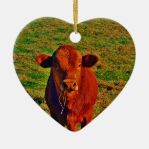 BABY BROWN COW EATING CERAMIC ORNAMENT