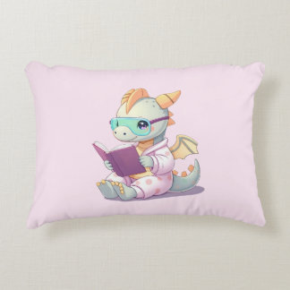 Baby dragon reading a book decorative cushion