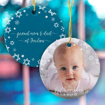 Baby First Hanukkah Stars Snowflakes New Parents Ceramic Ornament<br><div class="desc">“First Hanukkah.” A playful visual of white Stars of David, snowflakes and handwritten script typography with customised year, overlaying the photo of your choice, help you usher in Hanukkah and New Year. On the back, additional white Stars of David, snowflakes and handwritten typography with “proud mum & dad of baby’s...</div>