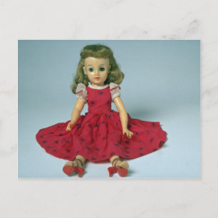 Baby girl doll dressed in red postcard