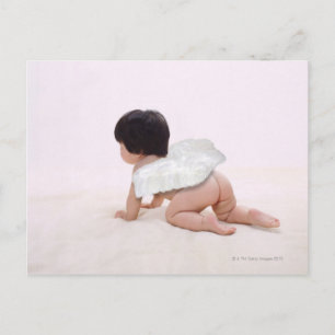 Baby girl in angel wings, smiling, rear view postcard