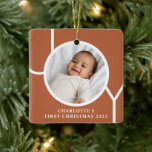 Baby Girl's First Christmas Photo Terracotta Ceramic Ornament<br><div class="desc">This simple Baby Girl's First Christmas Photo Ornament is decorated with the word JOY on a terracotta background.
Easily customisable with your photo,  name,  and year.</div>