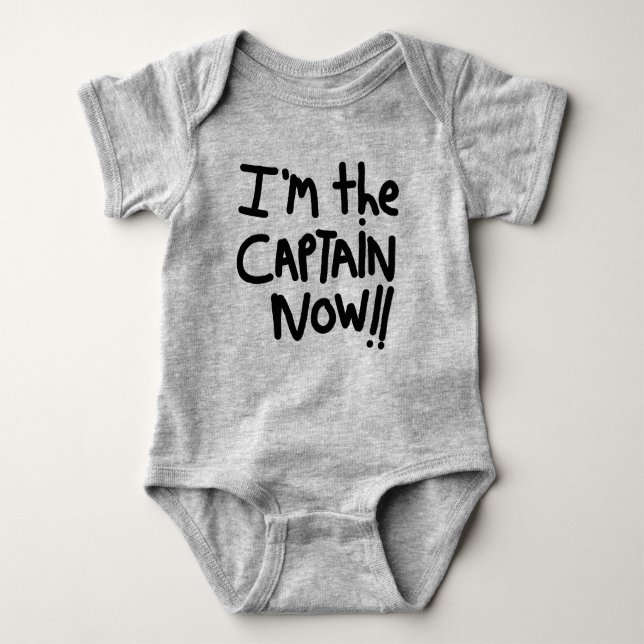 BABY IS THE CAPTAIN - BOTTOM LINE. BABY BODYSUIT (Front)